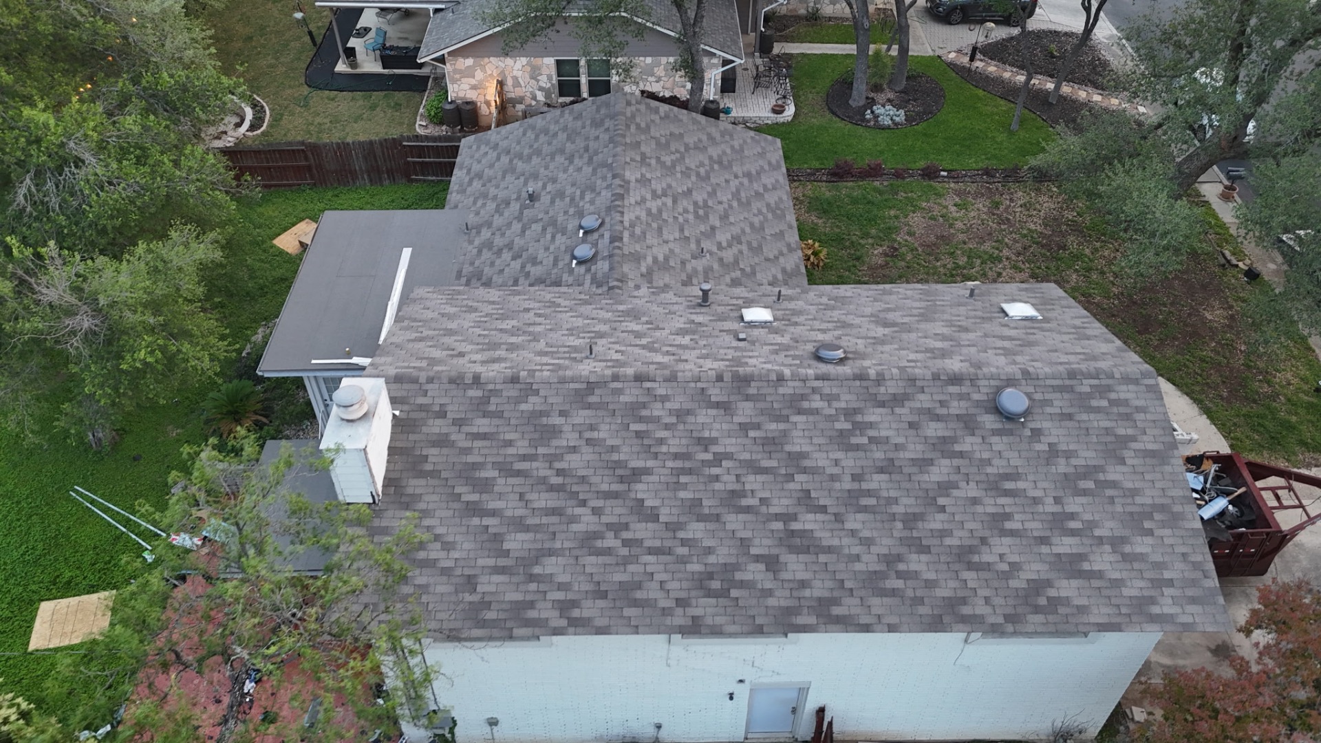 Aerial of finished roof replacement and low-slope modified bitumen tie-in