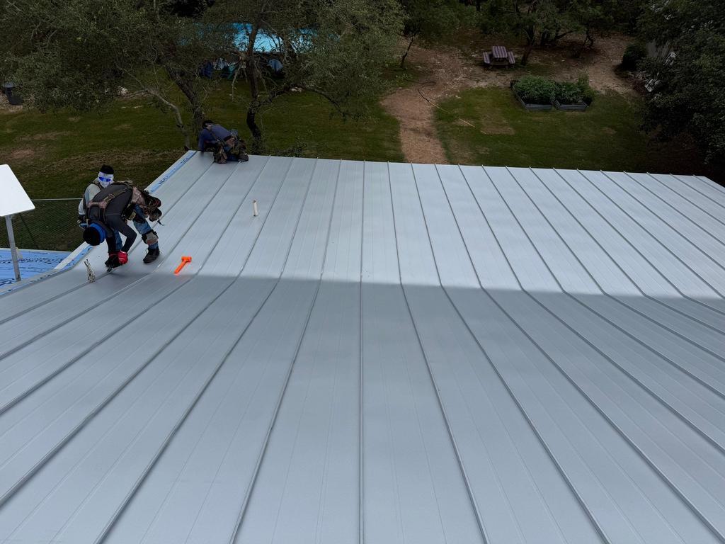 Finished standing seam roof from the ridge