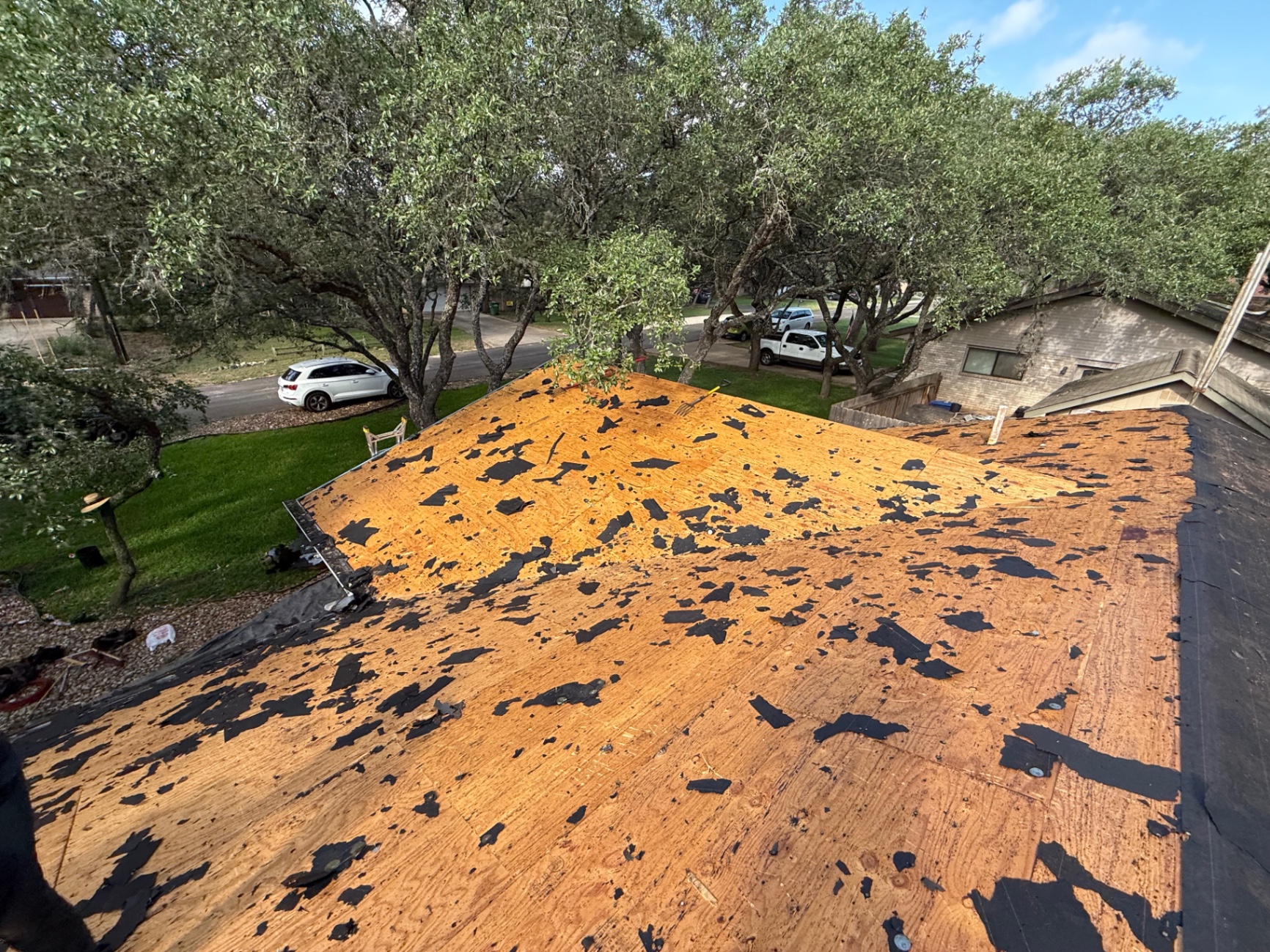 Exposed roof decking in Hollywood Park after tear-off with old felt removed