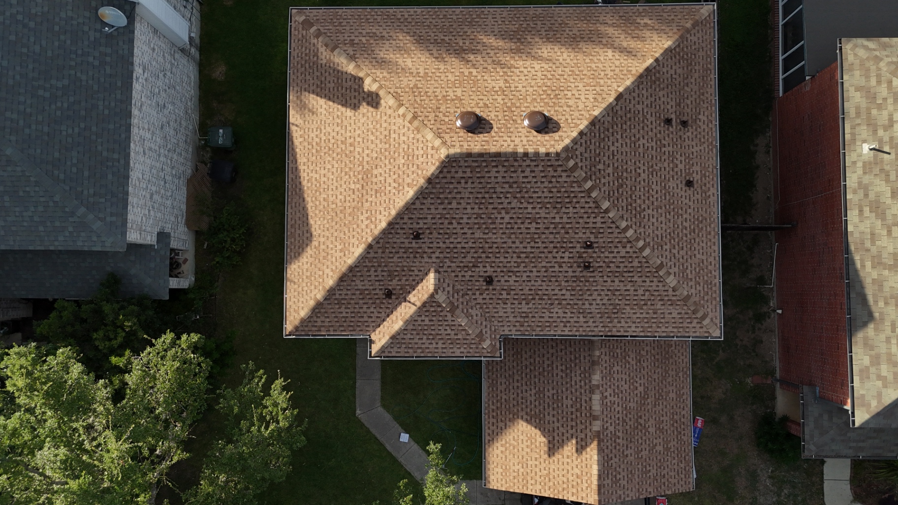 Completed Braun Station roof viewed from above showing finished ridges and roof geometry