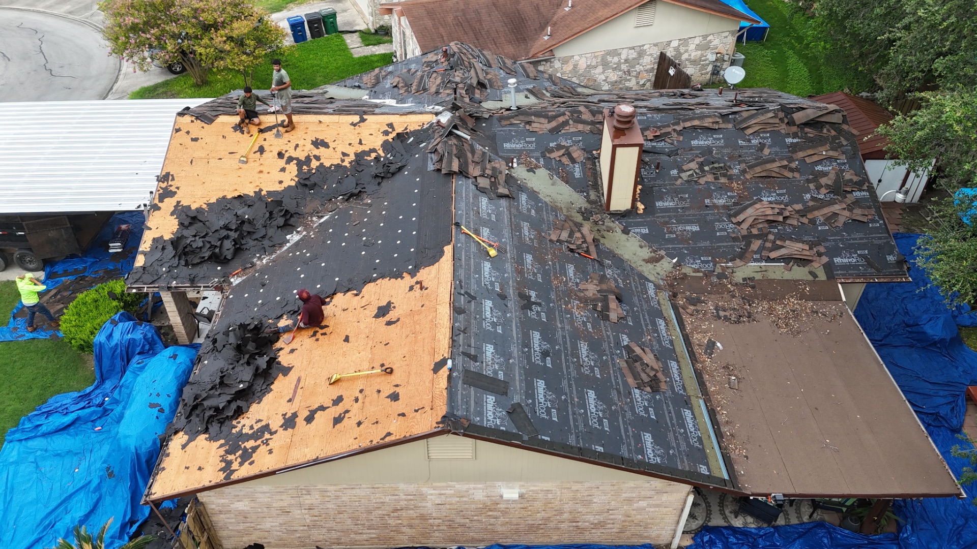 Tear-off continued — felt removed exposing the original decking