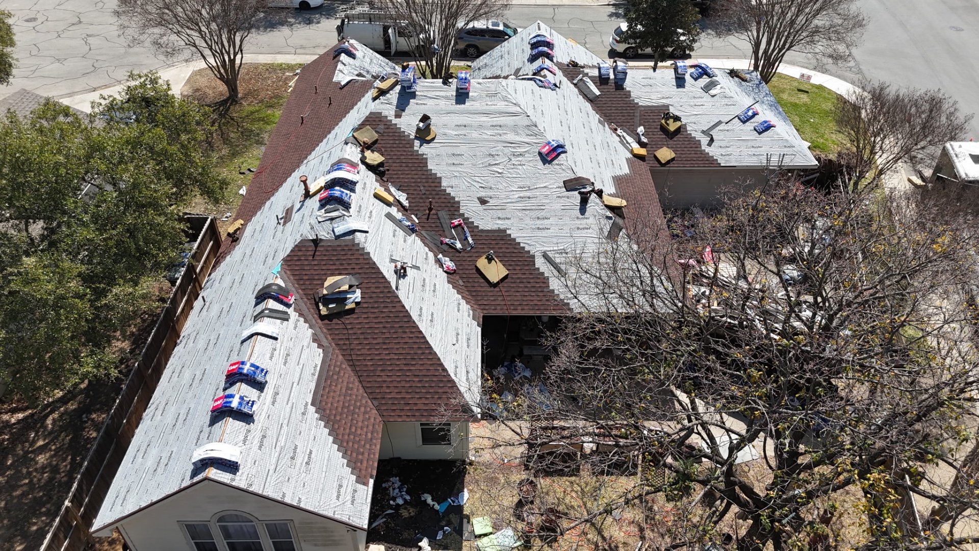 Rear aerial of Helotes roof replacement during dry-in stage