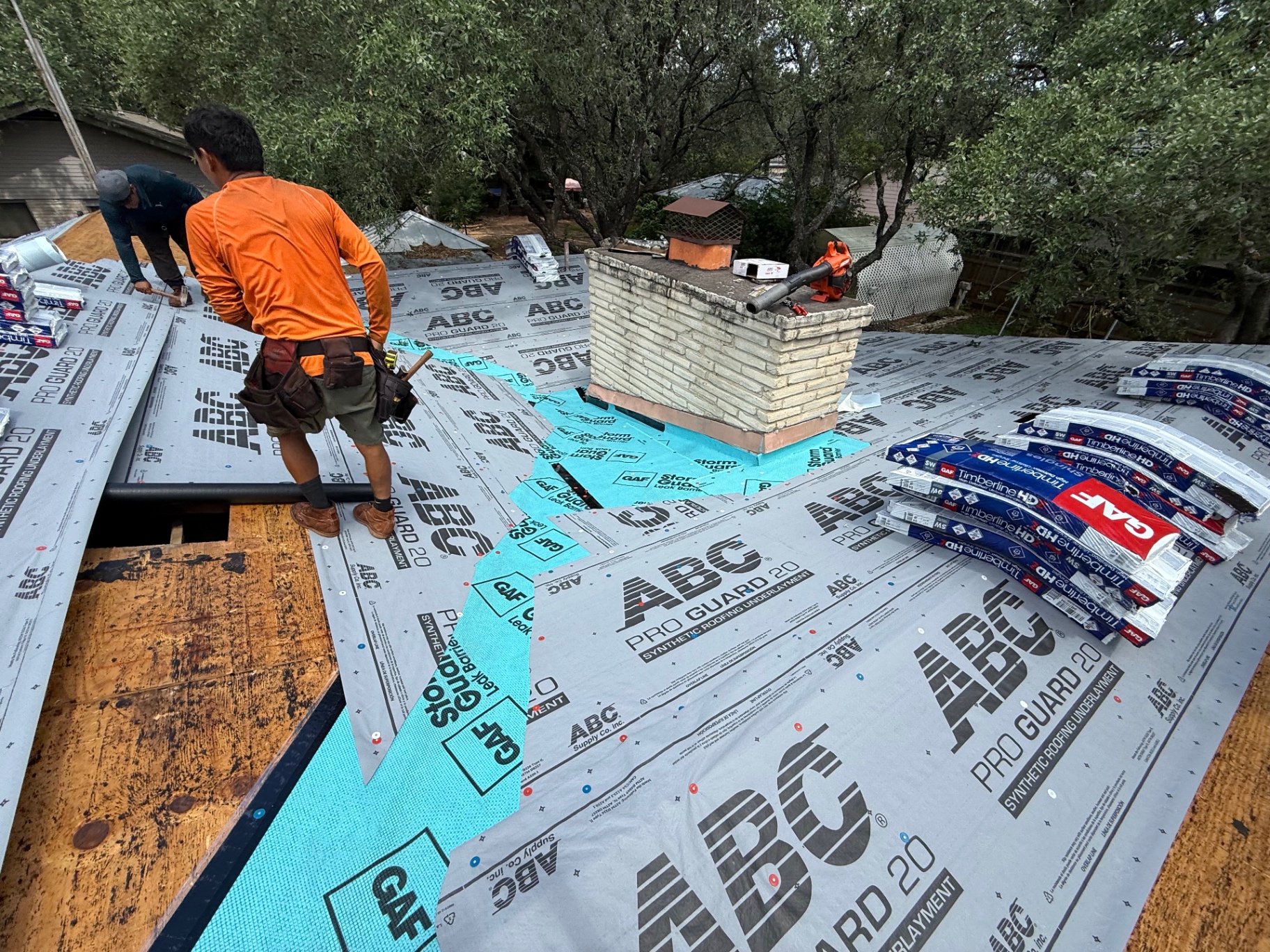Hollywood Park roof dried in with synthetic underlayment before GAF Timberline HDZ shingle installation
