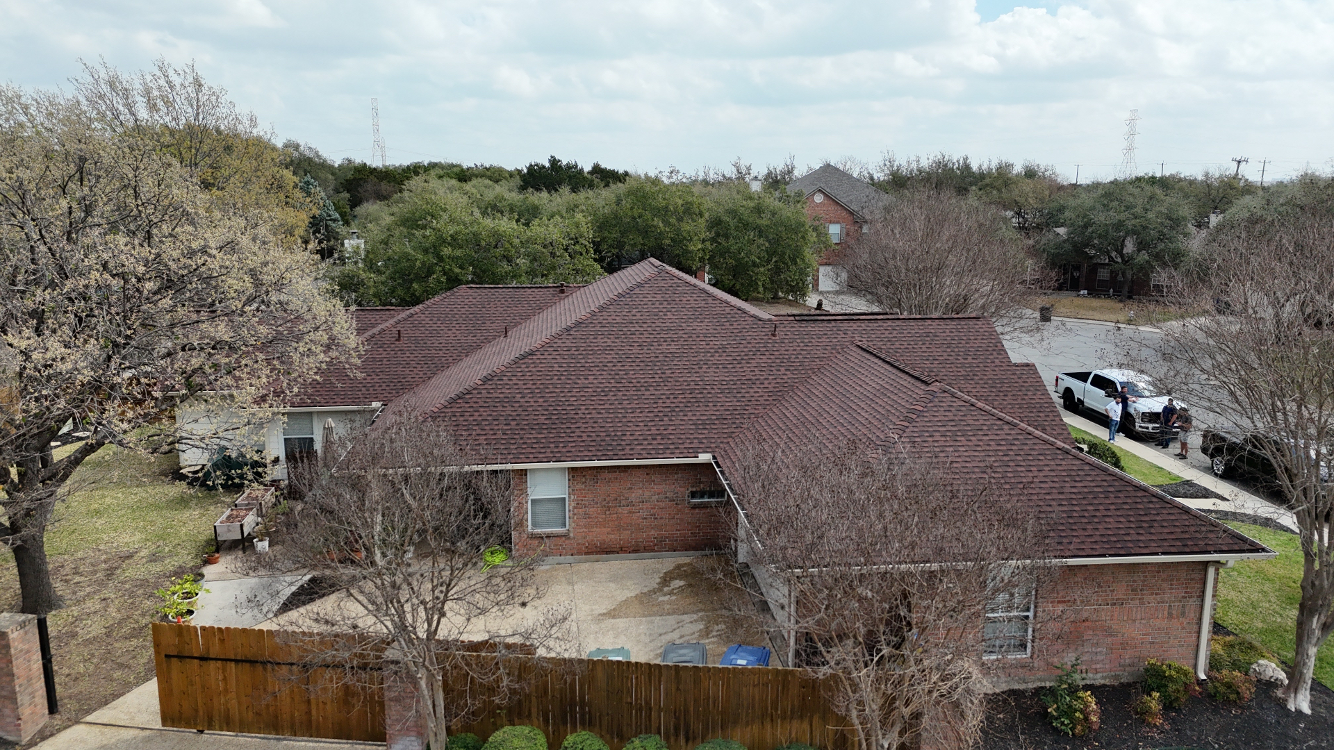 Aerial side view of completed Helotes roof replacement