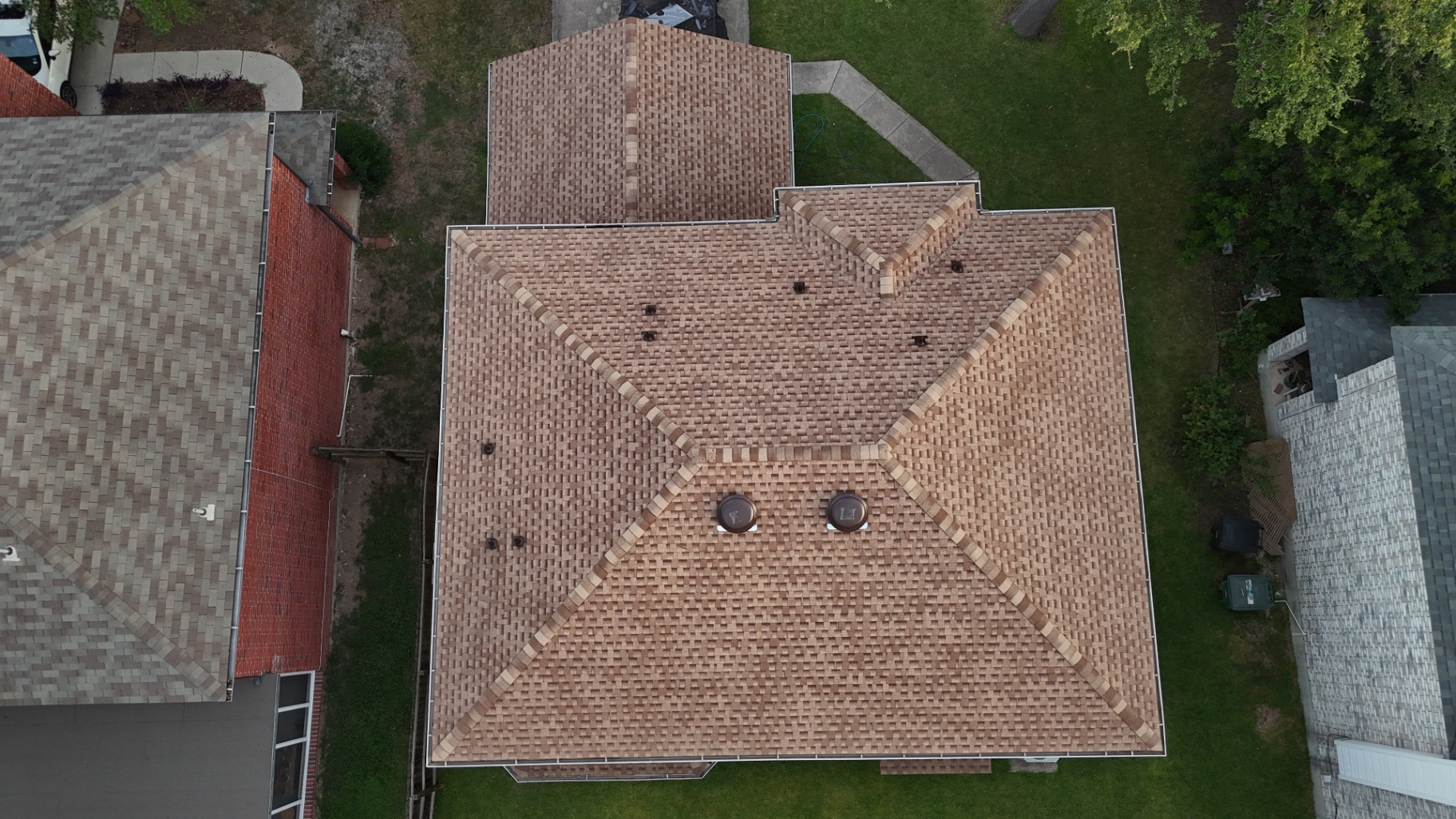 Top-down drone view of completed Braun Station GAF Timberline HDZ roof replacement