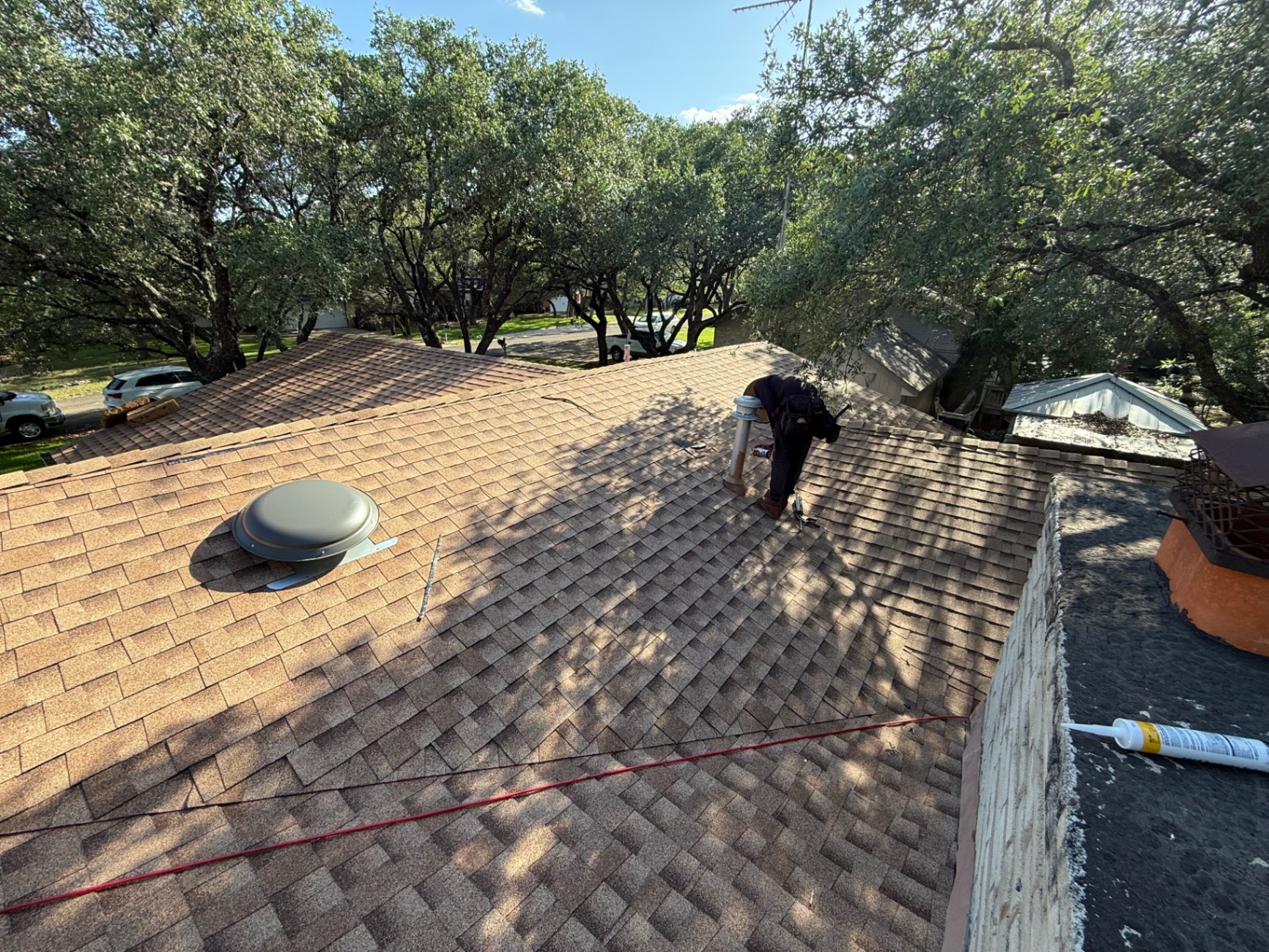 Completed Hollywood Park roof replacement with GAF Timberline HDZ shingles viewed from above